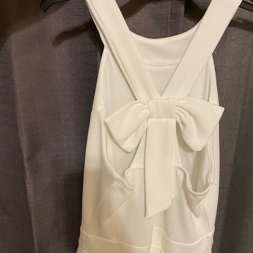 White dress. Bow on the back. S/M